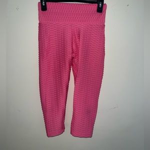 Medium size. Pink pants.